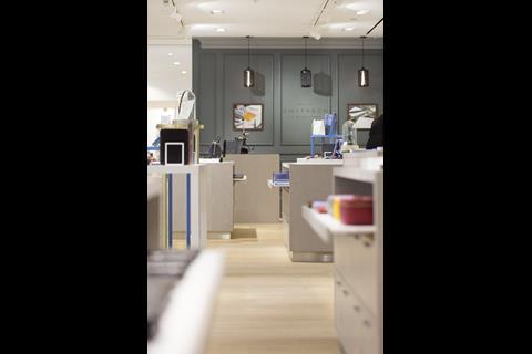 Grey shelving and white tables provide a neutral backdrop